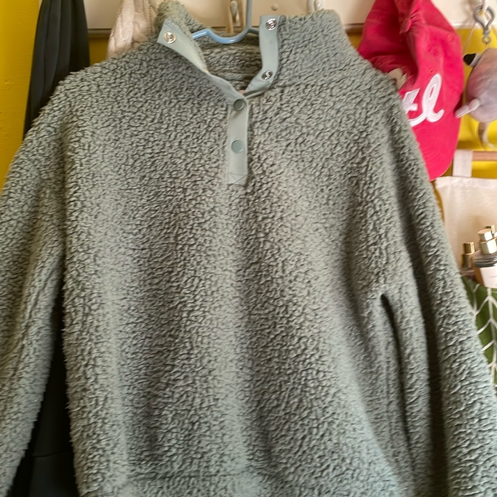 Green fuzzy sweater
